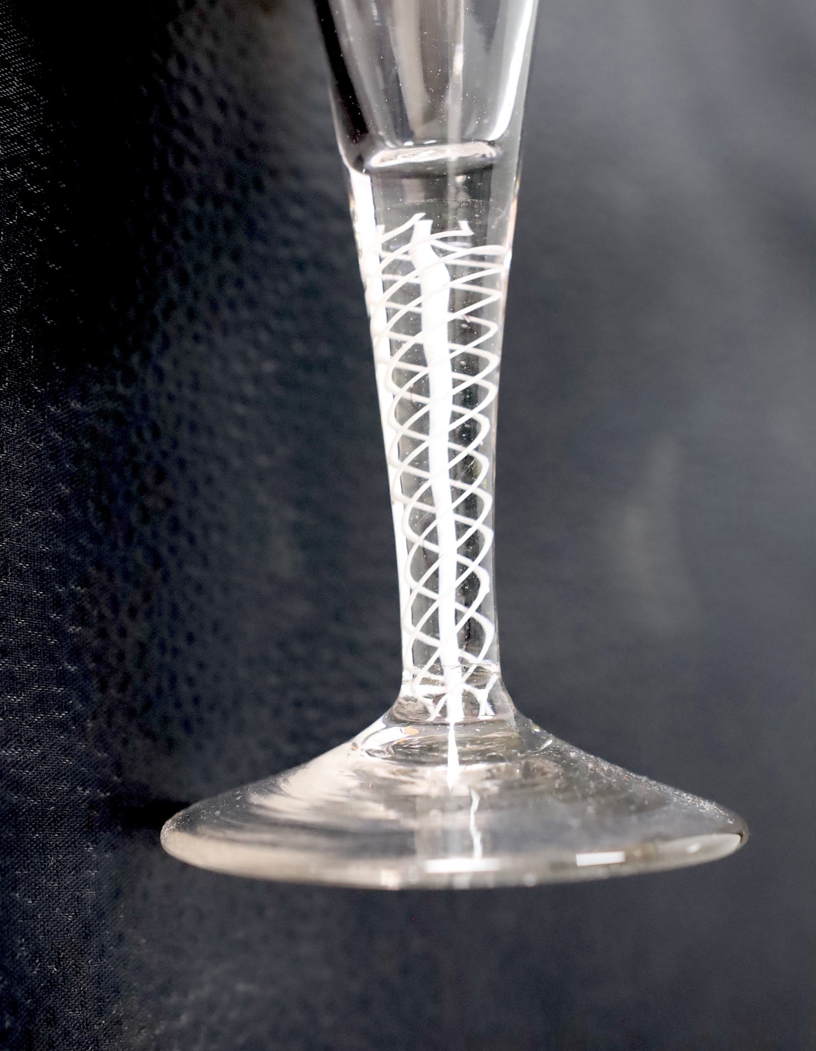 A George III DSOT stem ale flute. 19cm tall